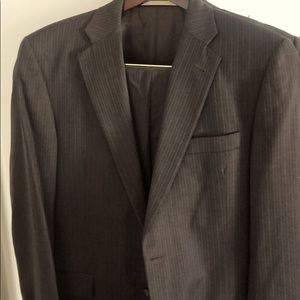 Brown Burberry suit with thin blue pinstripes.